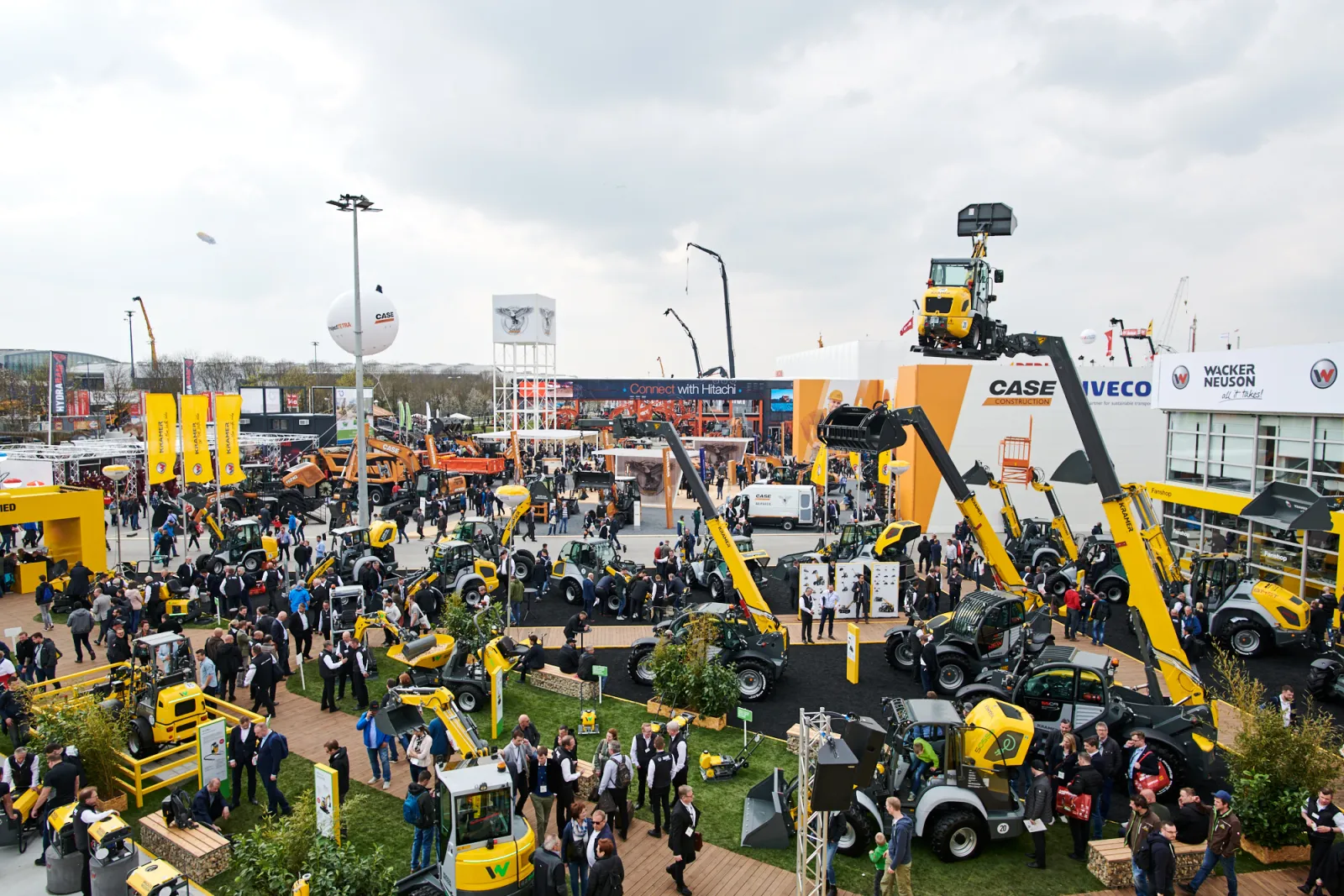 The open-air machinery ground at bauma in Munich, with Wacker Neuson, CASE Construction and Kramer stands at a previous edition