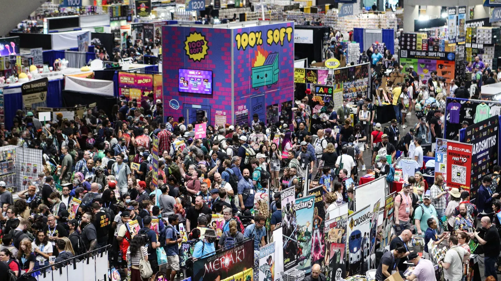 The Comic-Con exhibit hall floor packed with crowds between comic, collectible and merchandise booths at a previous edition